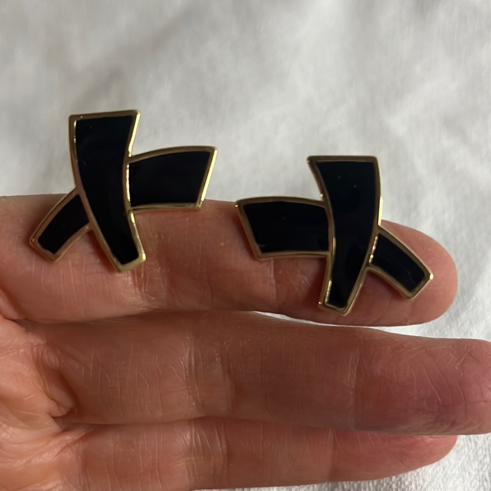 Monet vintage clip earrings, black cross edged in gold tone.